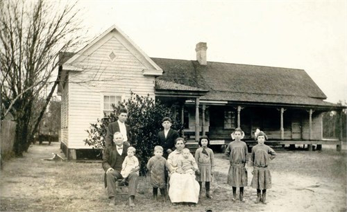 Standing in Back from Left: Edward Bundy Kinlaw, Harvey C. Kinlaw. In Front from Left to Right: Neil Archibald Kinlaw holding LeRoy Kinlaw, (N. A.) Neil Archibald Kinlaw, Jr., Sallie Lewis Kinlaw holding Lacy Lewis Kinlaw, Lillian Louise Kinlaw (O'Quinn), Annie Elizabeth Kinlaw (Herring) and Ila Mae Kinlaw (Broadwell)